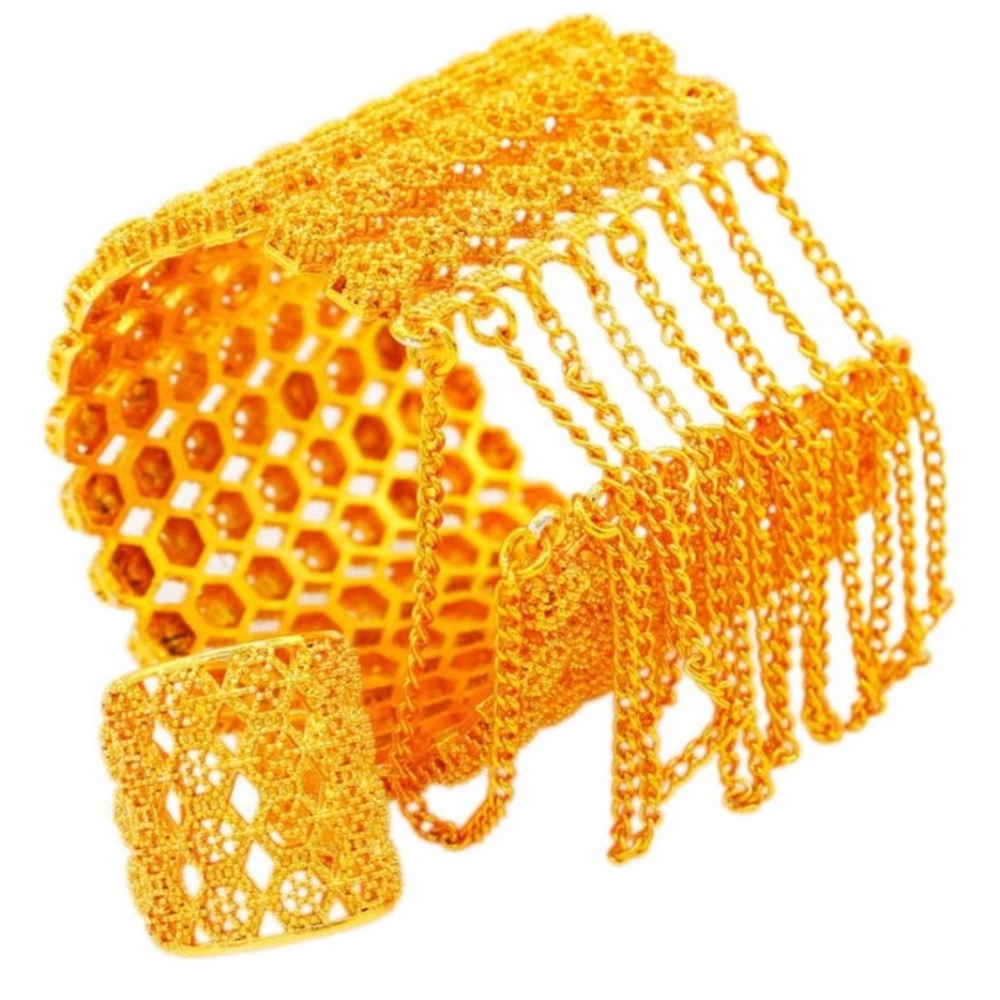 Gold cuff bangle with ring